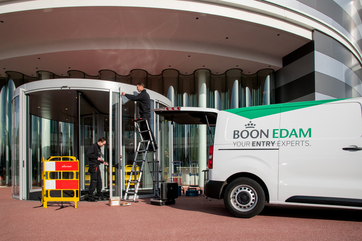 techs_van_revolving_door